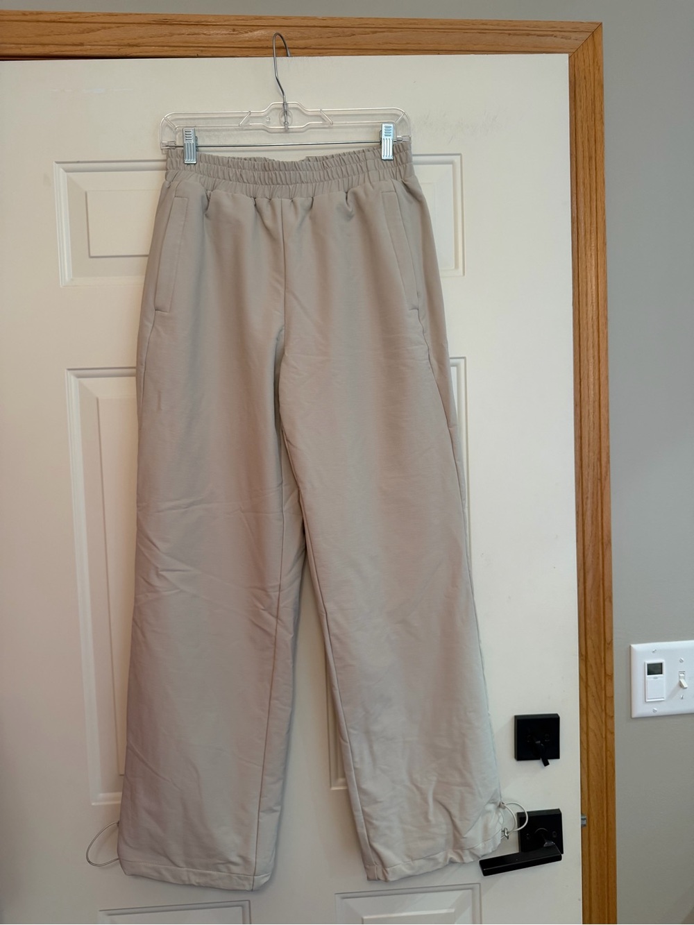 New OGL beige waterproof fleece lined elastic waist performance pants. Medium